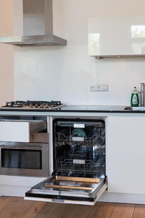 אמסטרדם Penthouse Spacious Apartment With Canal View מראה חיצוני תמונה